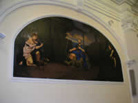 Il grande dipinto sul lato sinistro della chiesa di S. Rocco