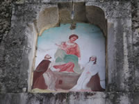 Dipinto che si vede sul portale della Cappella situata nella parte posteriore della Collegiata di San Giovanni Battista
