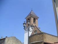 Il campanile della nuova chiesa dedicata alla Madonna delle Grazie